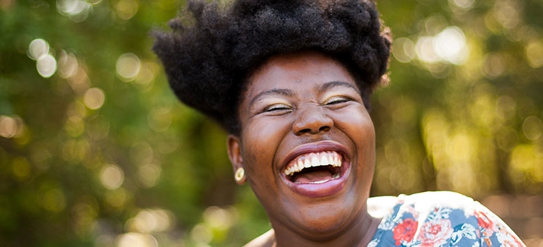 Woman laughing outside